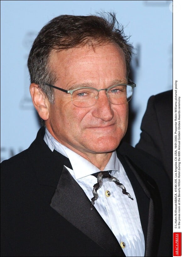 Le présentateur Robin Williams pose dans la salle de presse de l'hôtel Beverly Hilton lors de la 60e cérémonie annuelle des Golden Globes, le 19 janvier 2003. L.Hahn-N.Khayat/ABACA.