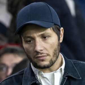 Vianney dans les tribunes du match de Ligue 1 Uber Eats "PSG-Lille" (3-1) au Parc des Princes à Paris le 10 février 2024. © Cyril Moreau/Bestimage