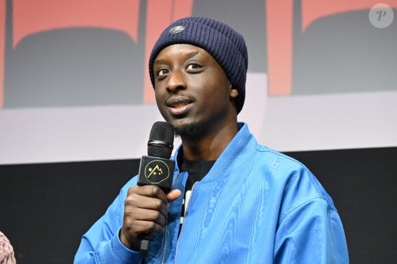 L'humoriste a affronté de terribles épreuves, comme la mort tragique de son meilleur ami, en 2008.
Ahmed Sylla assiste à la projection du film Ici et la-bas lors du 27ème festival du film de comédie à L'Alpe d'Huez, le 19 janvier 2024. Mireille Ampilhac/ABACAPRESS.COM