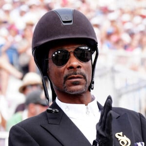 Pour ses délires, plus fous les uns que les autres, il aurait touché 8,5 millions d'euros pour la quinzaine !Snoop Dogg regarde le Grand Prix Spécial de Dressage au Château de Versailles le huitième jour des Jeux Olympiques de Paris 2024 à Paris, France, le 3 août 2024. Photo par Mike Egerton/PA/ABACAPRESS.COM