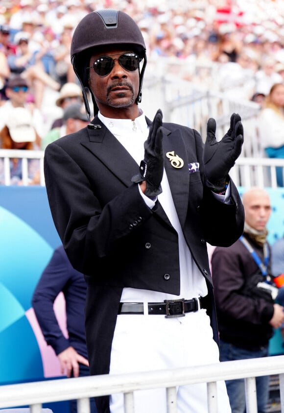 Pour ses délires, plus fous les uns que les autres, il aurait touché 8,5 millions d'euros pour la quinzaine !Snoop Dogg regarde le Grand Prix Spécial de Dressage au Château de Versailles le huitième jour des Jeux Olympiques de Paris 2024 à Paris, France, le 3 août 2024. Photo par Mike Egerton/PA/ABACAPRESS.COM