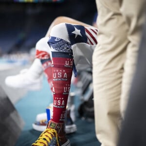 Détail de la jambe, de la chaussure et des chaussettes de Snoop Dogg alors qu'il assiste au match de basket entre Team USA et Team Brazil lors de la onzième journée des Jeux olympiques d'été de Paris 2024 à Paris, France, le 6 août 2024. Photo par Eliot Blondet/ABACAPRESS.COM