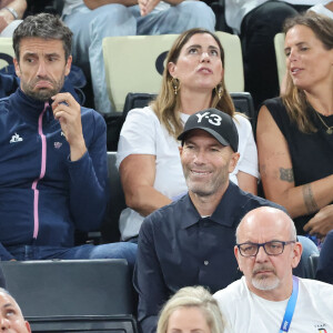 Tony Estanguet, Zinédine Zidane et Laure Manaudou - Les célébrités en tribunes pendant l'épreuve de basketball de Demi-Finale opposant la France à l'Allemagne lors des Jeux Olympiques de Paris 2024 (JO) à l'Arena Bercy, à Paris, France, le 8 août 2024. © Jacovides-Perusseau/Bestimage 