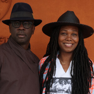 Lilian Thuram et sa femme Kareen Guiock ont aussi fait le déplacement en Guadeloupe afin de participer à la fête en l'honneur du judoka français
Lilian Thuram et sa femme Kareen Guiock Thuram - Célébrités au village des Internationaux de France de tennis de Roland Garros 2024 à Paris le 7 juin 2024. © Jacovides-Moreau/Bestimage  Celebrities in the stands of the 2024 Roland Garros French Open tennis tournament in Paris on June 7, 2024.