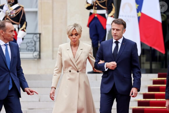 ils viennent de perdre un proche, Grégoire Campion...
Emmanuel Macron, Président de la République Française, et la Première dame Brigitte Macron, accueillent les chefs d'Etat et de gouvernement présents à Paris pour la cérémonie d'ouverture des Jeux Olympiques de Paris 2024 (JO) Paris, le 26 juillet 2024. © Dominique Jacovides - Pierre Perusseau / Bestimage