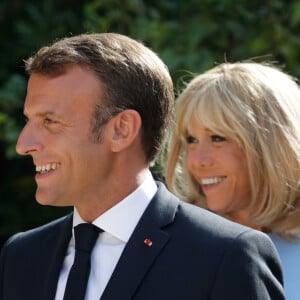 Le président de la République française Emmanuel Macron et sa femme la Première Dame Brigitte Macron à Bormes-les-Mimosas, France, le 19 août 2019.