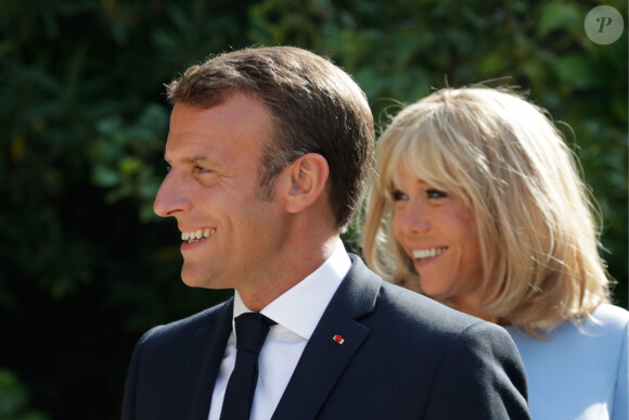 Le président de la République française Emmanuel Macron et sa femme la Première Dame Brigitte Macron à Bormes-les-Mimosas, France, le 19 août 2019.