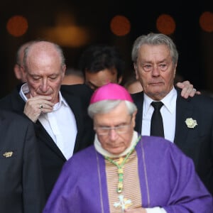 Monseigneur Di Falco et Alain Delon se connaissaient de longue date...Monseigneur Di Falco, Pascal Desprez et Alain Delon - Sorties des obsèques de Mireille Darc en l'église Saint-Sulpice à Paris. Le 1er septembre 2017