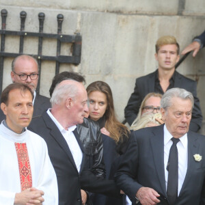 Monseigneur Di Falco, Pascal Desprez, Alain Delon, Anthony Delon, le fils de Pascal Desprez et sa femme - Sorties des obsèques de Mireille Darc en l'église Saint-Sulpice à Paris. Le 1er septembre 2017