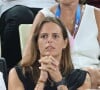 On peut lire l'expression "lâcher prise"
 
Laure Manaudou - Les célébrités en tribunes pendant l'épreuve de basketball de Demi-Finale opposant la France à l'Allemagne lors des Jeux Olympiques de Paris 2024 (JO) à l'Arena Bercy, à Paris, France, le 8 août 2024. © Jacovides-Perusseau/Bestimage