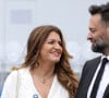 Marlène Schiappa Secrétaire d'Etat auprès de la Première ministre, chargée de l'Economie sociale et solidaire et de la Vie associative et sonn compagnon lors de la cérémonie du 143ème défilé militaire du 14 juillet, jour de la Fête Nationale, sur les Champs-Elysées et la place de la Concorde, à Paris, France. © Stéphane Lemouton/Bestimage 