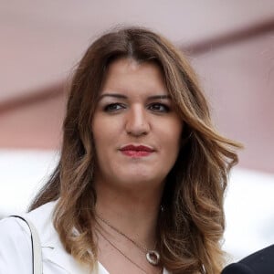 Marlène Schiappa Secrétaire d'Etat auprès de la Première ministre, chargée de l'Economie sociale et solidaire et de la Vie associative et sonn compagnon lors de la cérémonie du 143ème défilé militaire du 14 juillet, jour de la Fête Nationale, sur les Champs-Elysées et la place de la Concorde, à Paris, France. © Stéphane Lemouton/Bestimage 