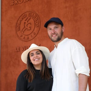 Inés Reg et Kevin Debonne - People au village lors des Internationaux de France de Tennis de Roland Garros à Paris. Le 10 juin 2021 © Dominique Jacovides / Bestimage 