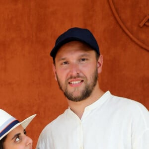 Inès Reg et Kevin Debonne - People au village lors des Internationaux de France de Tennis de Roland Garros à Paris. Le 10 juin 2021 © Dominique Jacovides / Bestimage 