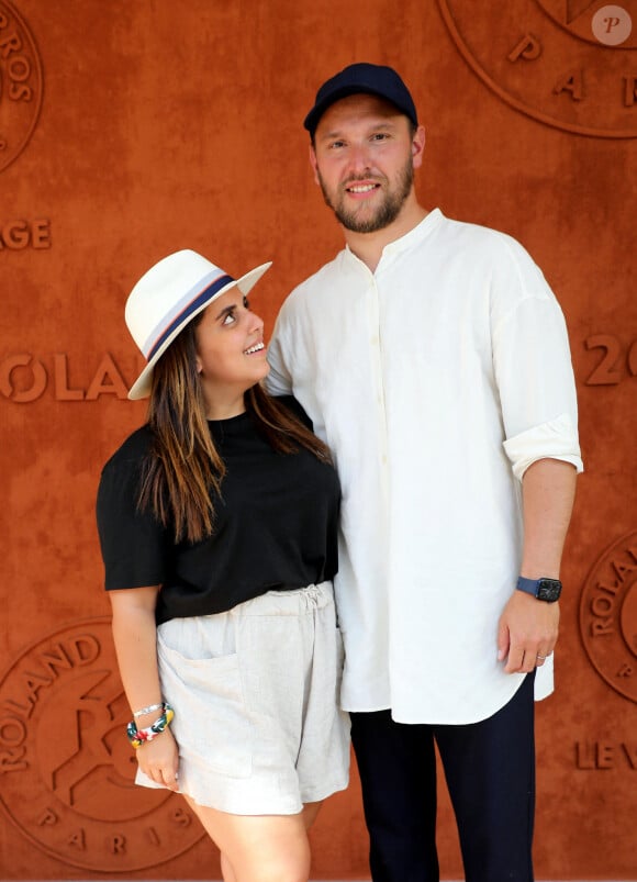 Inès Reg et Kevin Debonne - People au village lors des Internationaux de France de Tennis de Roland Garros à Paris. Le 10 juin 2021 © Dominique Jacovides / Bestimage 