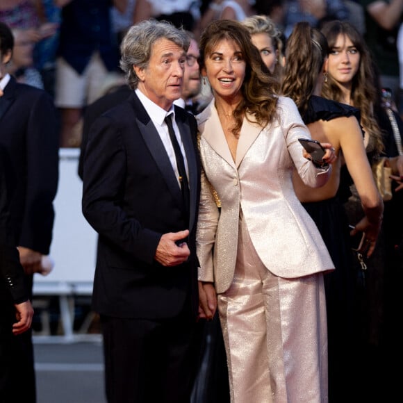 Cette phrase que sa compagne entend souvent 
François Cluzet et sa femme Narjiss Slaoui-Falcoz - Montée des marches du film " Mascarade " lors du 75ème Festival International du Film de Cannes. Le 27 mai 2022 © Cyril Moreau / Bestimage 