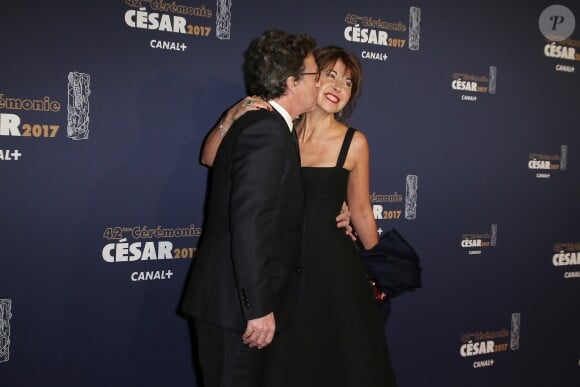 François Cluzet et sa femme Narjiss - Photocall de la 42ème cérémonie des Cesar à la salle Pleyel à Paris, le 24 février 2017. © Dominique Jacovides - Olivier Borde / Bestimage