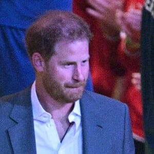 Le prince Harry et Meghan Markle lors de la cérémonie d'ouverture des Invictus Games 2020 à La Haye, le 16 avril 2022. 