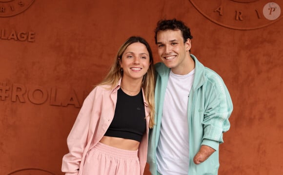 Théo Curin et sa compagne Marie-Camille Fabas au village lors des Internationaux de France de tennis de Roland Garros 2023, à Paris, France, le 11 juin 2023. © Jacovides-Moreau/Bestimage 