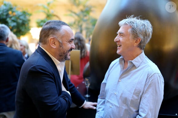 Exclusif - François-Xavier Demaison et François Cluzet à l'exposition "Douceur animale" de Michel Bassompierre à l'InterContinental Paris - Le Grand le 17 septembre 2024. s figures des causes environnementales échangeront sur la fragilité du monde vivant. © Rachid Bellak / Bestimage 