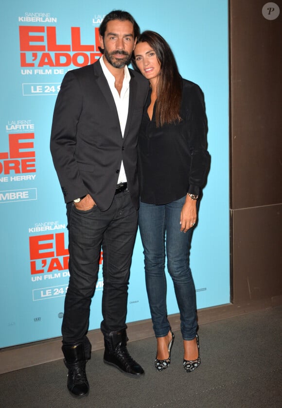 Info - Robert Pires annonce sa retraite, dernier champion du monde 1998 à le faire - Robert Pirès et sa femme Jessica - Avant-première du film "Elle l'adore" au cinéma UGC Normandie à Paris, le 15 septembre 2014. 