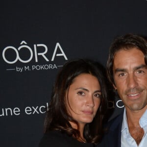 Exclusif - No web - No blog - Robert Pires et sa femme Jessica - Soiree de lancement de la collection "Oora by M. Pokora" en exclusivite chez Cache-Cache, au Pavillon Gabriel a Paris, le 5 septembre 2013. 