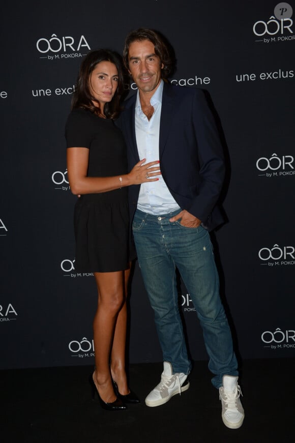 Exclusif - No web - No blog - Robert Pires et sa femme Jessica - Soiree de lancement de la collection "Oora by M. Pokora" en exclusivite chez Cache-Cache, au Pavillon Gabriel a Paris, le 5 septembre 2013. 