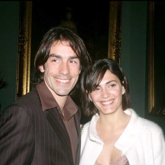 ROBERT PIRES ET SA FIANCEE JESSICA LE MARIE - COCKTAIL LORS DU FESTIVAL DU FILM FRANCAIS RENAULT A LONDRES 31st March, 2005: The Renault French Film Festival cocktail party held at The Institute of Directors, Pall Mall, London. Among those attending, Arsenal footballer Robert Pires & Jessica le Marie. 