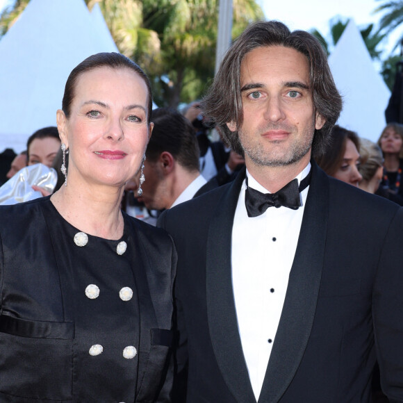 Carole Bouquet et son fils Dimitri Rassam - Montée des marches du film " Megalopolis " lors du 77ème Festival International du Film de Cannes, au Palais des Festivals à Cannes.