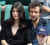 Cyrille Eldin se retrouve dans la tourmente.
Cyrille Eldin et sa compagne Sandrine Calvayrac dans les tribunes des internationaux de Roland Garros à Paris. © Cyril Moreau - Dominique Jacovides / Bestimage