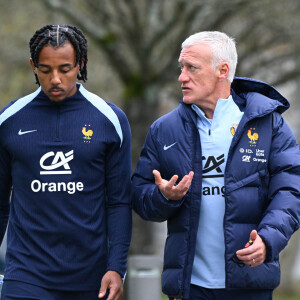 Didier Deschamps ( coach France ) talks with Jules Kounde ( France ) during a Team France training session at French National Football Center on march 18, 2024 in Clairefontaine-en-Yvelines, France. © Federico Pestellini/Panoramic/Bestimage