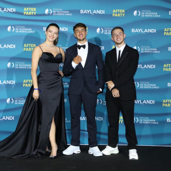 Michou, Elsa Bois et Inoxtag au photocall de l'after party de la cérémonie d'ouverture de la 61ème édition du Festival de Télévision de Monte-Carlo au Monte Carlo Beach, à Monaco, le 17 juin 2022. © Denis Guignebourg/BestImage