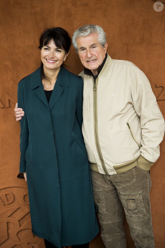 Claude Lelouch et sa femme Valérie Perrin au village des internationaux de France de tennis de Roland Garros 2019 à Paris le 7 juin 2019. © JB Autissier / Panoramic / Bestimage