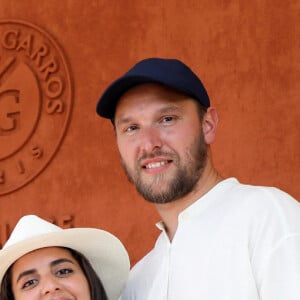 Inès Reg et Kevin Debonne - People au village lors des Internationaux de France de Tennis de Roland Garros à Paris. Le 10 juin 2021 © Dominique Jacovides / Bestimage