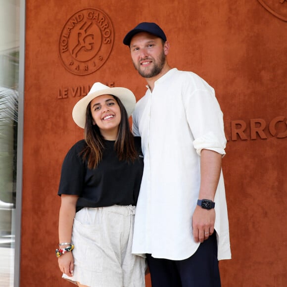 Inès Reg et Kevin Debonne - People au village lors des Internationaux de France de Tennis de Roland Garros à Paris. Le 10 juin 2021 © Dominique Jacovides / Bestimage