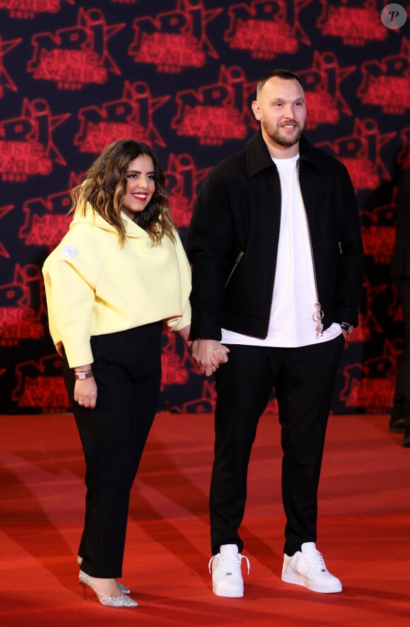 Inès Reg et Kévin Debonne lors de la 23ème édition des NRJ Music Awards 2021 au Palais des Festivals de Cannes, le 20 novembre 2021. © Dominique Jacovides/Bestimage 