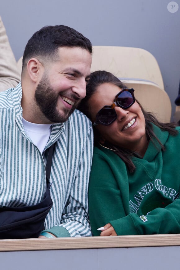 Inès Reg (Inès Reghioua) avec son meilleur ami Mickaël Montadir dans les tribunes des Internationaux de France de tennis de Roland Garros 2024 à Paris, France, le 3 juin 2024