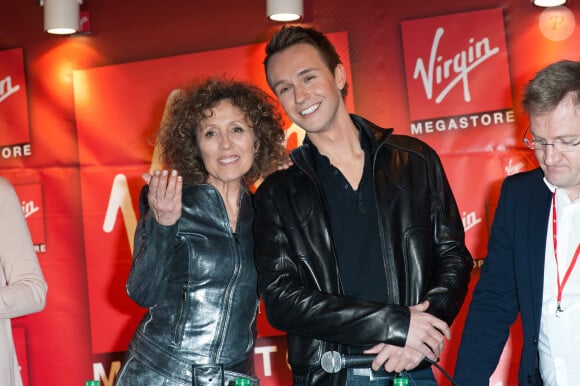 Mireille Dumas et Cyril Feraud lors d'un Showcase pour la conférence de presse du lancement de l'émission TV Eurovision 2012 qui s'est tenue au Virgin Megastore à Paris, France, le 26 avril 2012.