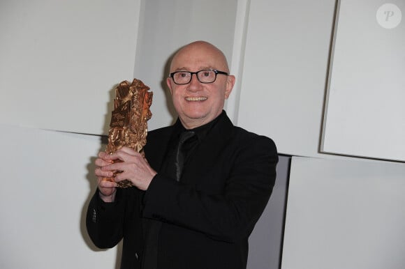 Michel Blanc pose lors du photocall de la 37e cérémonie des César du cinéma qui s'est tenue au Théâtre du Chatelet à Paris, France, le 24 février 2012.