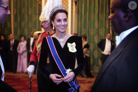 Les faux-pas de la princesse de Galles, s'il y en a, se comptent sur les doigts d'une main
Kate Middleton, duchesse de Cambridge - La reine Elisabeth II d'Angleterre reçoit les membres du corps diplomatique à Buckingham Palace, le 11 décembre 2019. 