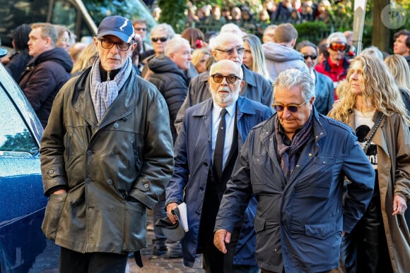 Thierry Lhermitte, Gérard Jugnot, Christian Clavier - Sortie des Obsèques de Michel Blanc en l'église Saint-Eustache à Paris, le 10 octobre 2024. © Moreau / Jacovides / Bestimage 