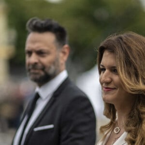 Matthias Savignac et Marlene Schiappa lors du défilé militaire du Jour de la Bastille sur l'avenue des Champs-Élysées à Paris, le 14 juillet 2023. Photo par Eliot Blondet/ABACAPRESS.COM