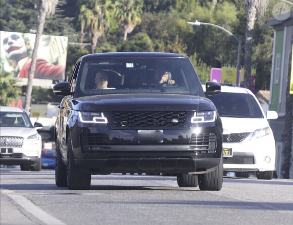 Exclusif - Bruce Willis se balade avec son chauffeur en SUV à Los Angeles