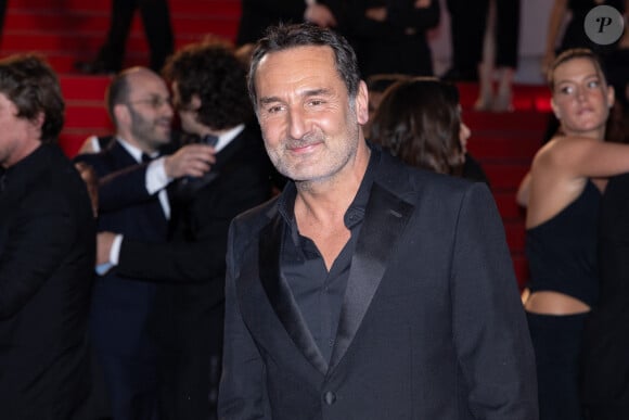 Gilles Lellouche quitte le tapis rouge de "L'Amour Ouf" au 77ème Festival de Cannes au Palais des Festivals le 23 mai 2024 à Cannes, France. Photo par Shootpix/ABACAPRESS.COM