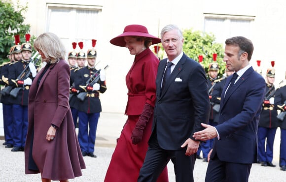 Le président de la République Emmanuel Macron et la première dame Brigitte Macron accueillent le roi Philippe et la reine Mathilde de Belgique à l'Elysée, le 14 octobre 2024, à l'occasion de leur visite officielle en France, du 14 au 16 octobre 2024. © Dominique Jacovides / Bestimage 