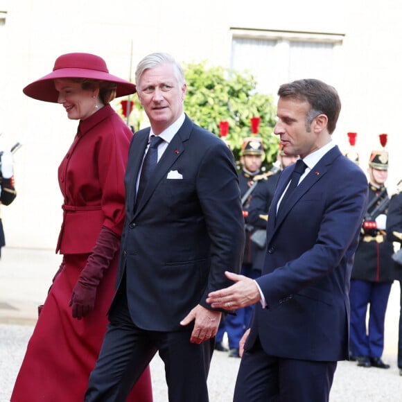 Le président de la République Emmanuel Macron et la première dame Brigitte Macron accueillent le roi Philippe et la reine Mathilde de Belgique à l'Elysée, le 14 octobre 2024, à l'occasion de leur visite officielle en France, du 14 au 16 octobre 2024. © Dominique Jacovides / Bestimage 