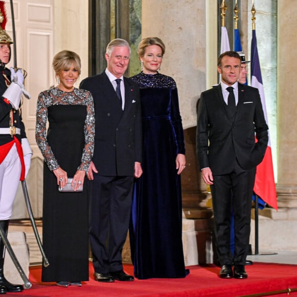 Arrivé le 14 octobre à la Gare du Nord, Philippe de Belgique, le roi des Belges Philippe et son épouse Mathilde ont entamé une visite d'Etat de trois jours en France.
Le président Emmanuel Macron, Brigitte Macron, Le roi Philippe de Belgique, La reine Mathilde de Belgique lors du dîner d'état au palais de l'Elysée à Paris en l'honneur du couple royal de Belgique, en visite d'état à Paris le 14 octobre 2024. © Frédéric Andrieu / Bestimage 