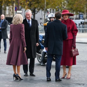 Le roi Philippe de Belgique, la reine Mathilde, Le président Emmanuel Macron, Brigitte Macron lors d'une cérémonie à l'Arc de Triomphe à Paris le 14 octobre 2024. © Frédéric Andrieu / Bestimage 