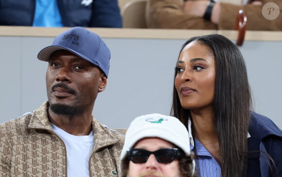 Harry Roselmack et Jennifer Galap - Les célébrités dans les tribunes des Internationaux de France de tennis de Roland Garros 2024 à Paris, le 29 mai 2024. © Jacovides / Moreau / Bestimage