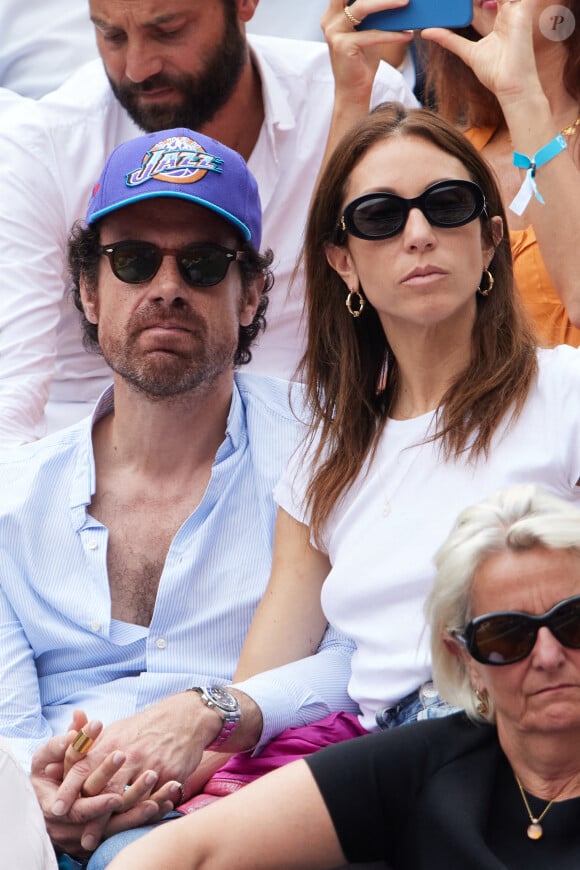 Mathias Vicherat et Anissa Bonnefont - Célébrités en tribunes des Internationaux de France de tennis de Roland Garros 2023 à Paris le 11 juin 2023. © Jacovides-Moreau/Bestimage